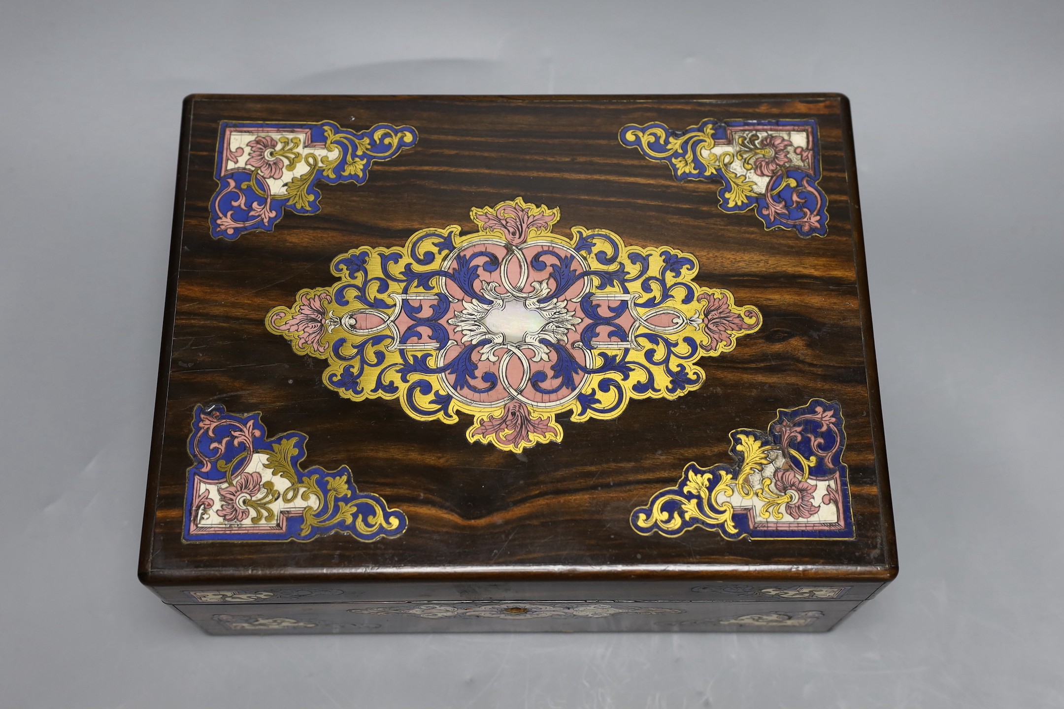 A French rosewood brass inlay and enamelled box, interior missing, 31 cms wide x 12 cms high